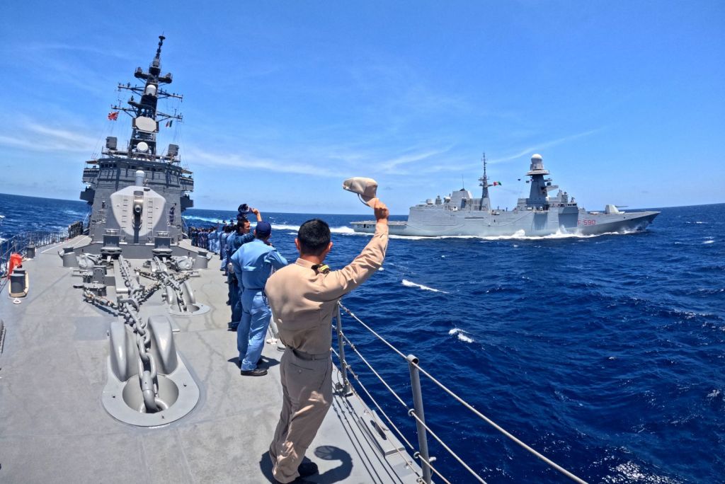 GULF OF ADEN (April 8, 2023) Sailors aboard Japanese Maritime Self-Defense Force destroyer JS Makinami (DD 112) wave to Italian Navy frigate ITS Carlo Bergamini (F 590) during combined training in the Gulf of Aden between Combined Maritime Forces and European Union Naval Forces, April 8, 2023. (Courtesy photo)
